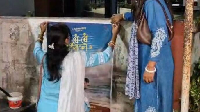 Fans work overnight to restore ‘Roi Roi Binale’ posters after vandalism in Kokrajhar